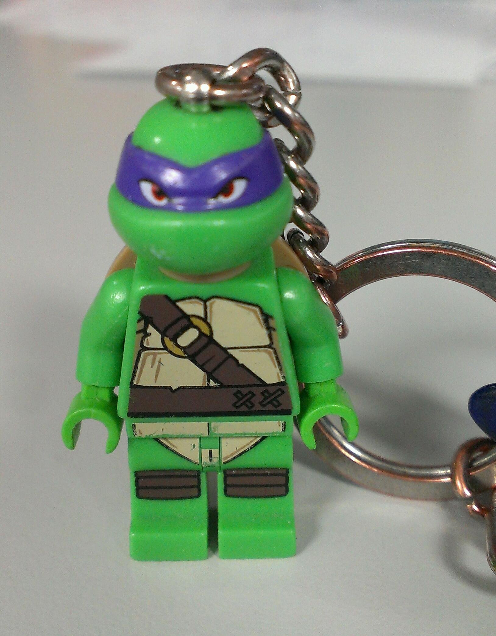 Worn minifig keychain